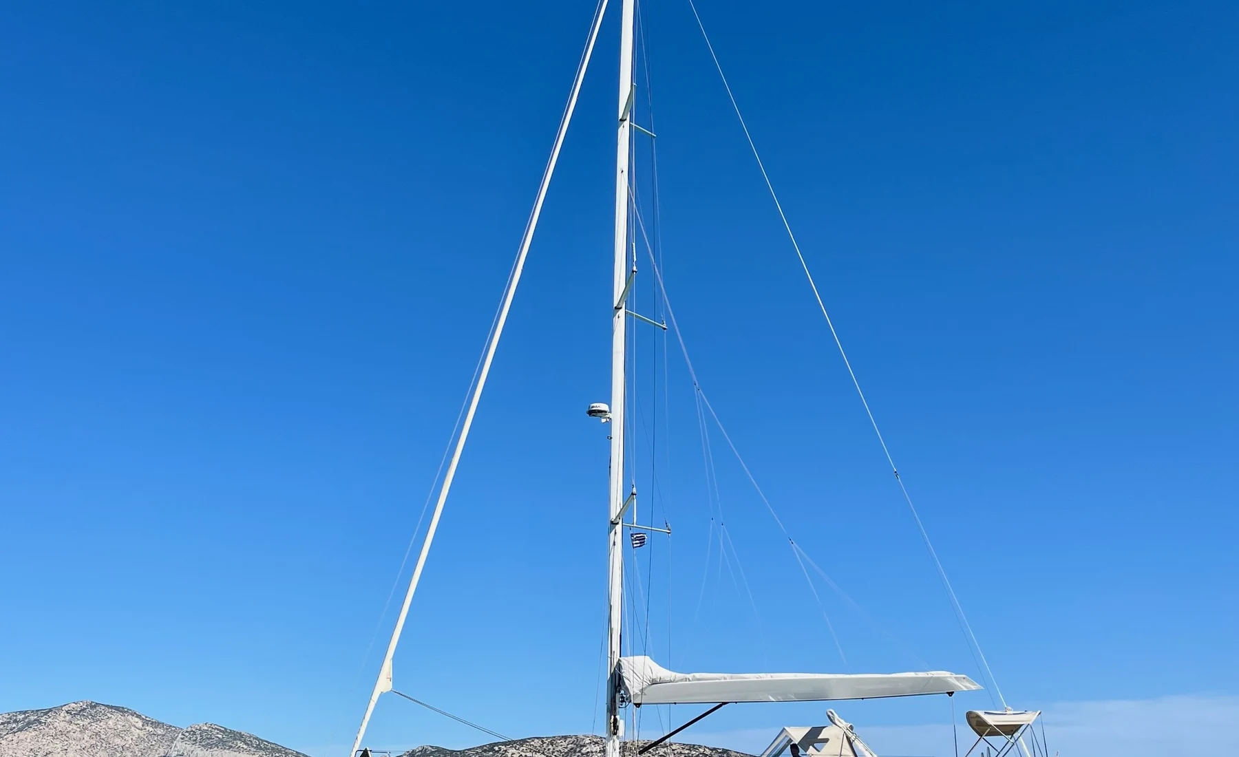 NAIS at anchor in turquoise water